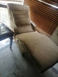 imported recliner, automatic reclining and heating system.