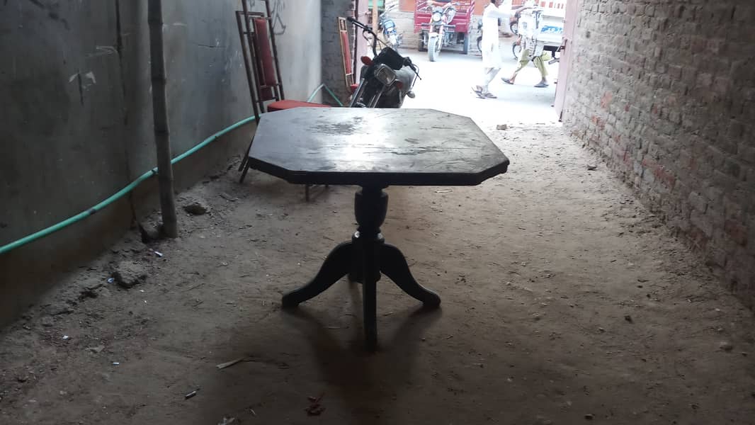 4 persons wooden table. . . 0