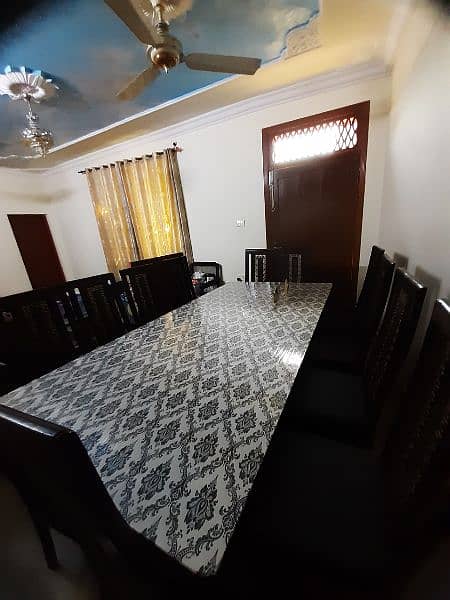 Glass Dinning Table with 12 chairs in New condition available for sale 2