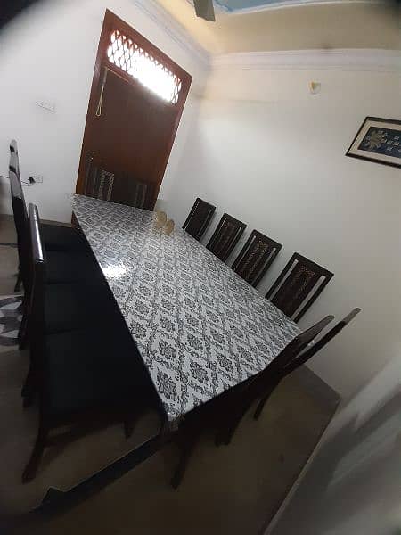 Glass Dinning Table with 12 chairs in New condition available for sale 3