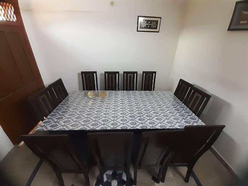 Glass Dinning Table with 12 chairs in New condition available for sale 4