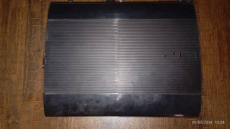 PS3 console with 3 games 1