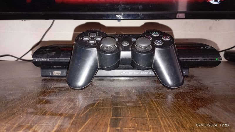 PS3 console with 3 games 3