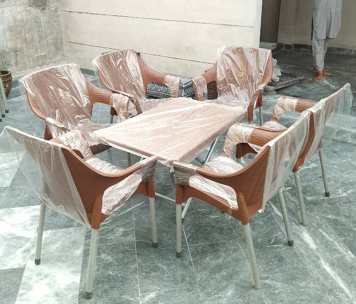 Plastic 6 Chairs 1 table set brown and chocolate. 5