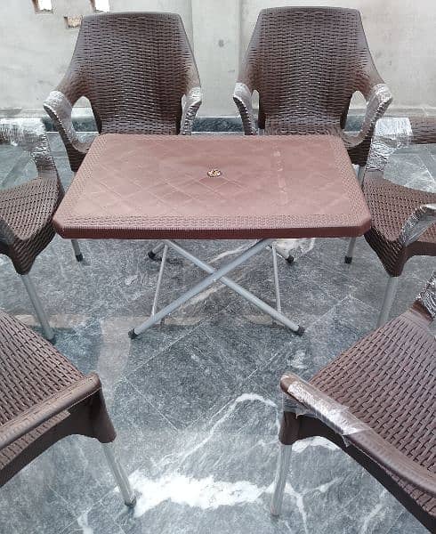 Plastic 6 Chairs 1 table set brown and chocolate. 18