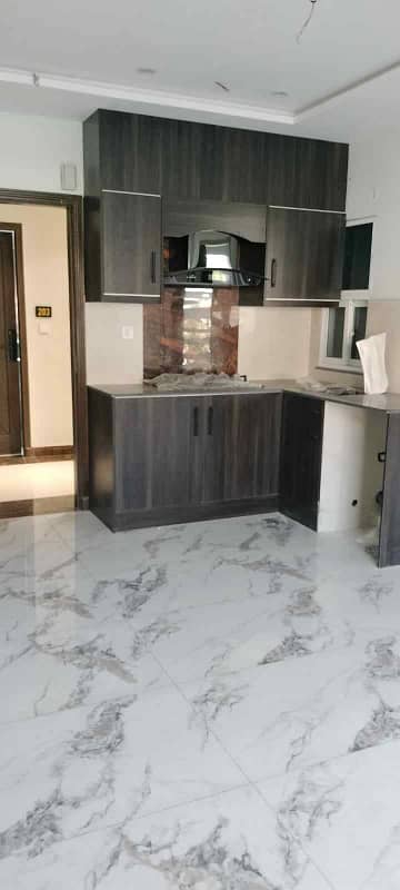 1BED BREAND NEW STUDIO SAMI FURNISHED APORTMENT IS AVAILABLE FOR SALE IN SECTOR F FCING EEFILE TOWER BAHRIA TOWN LAHORE 4