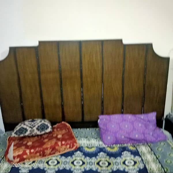 wooden double bed along with two side tables and dressing and matres 0