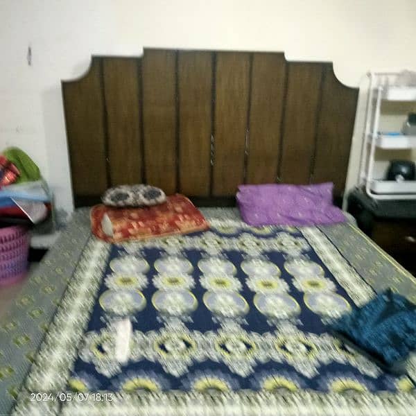 wooden double bed along with two side tables and dressing and matres 4