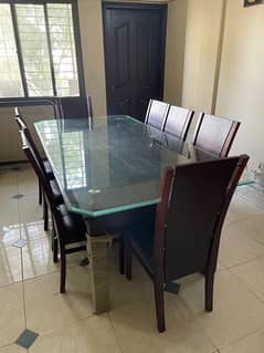 Wooden arm dining table for 8 persons