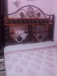 4.5 by 6 size bed with mattress in good and ok condition