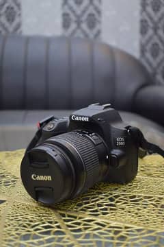 Canon 250D camera with 18-55mm lens