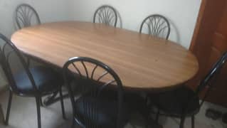 6seater wooden dining table with 6 iron rode chairs