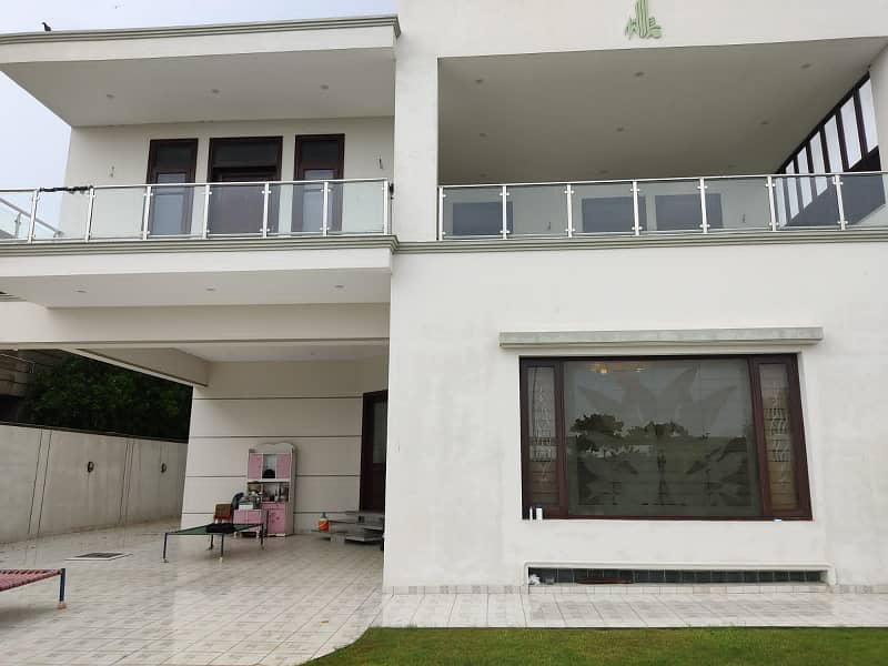 Dha Ph 8 Khe Ghalib | Architectural Marvel 1000 Yards 06 Bed House | Cosy Retreat Dining Room | Basement,Gymnasium,A State-Of-The-Art Home Theater | 10 Vehicle Parking | Servant Quaeter | Lush Greenery Lawn | 7