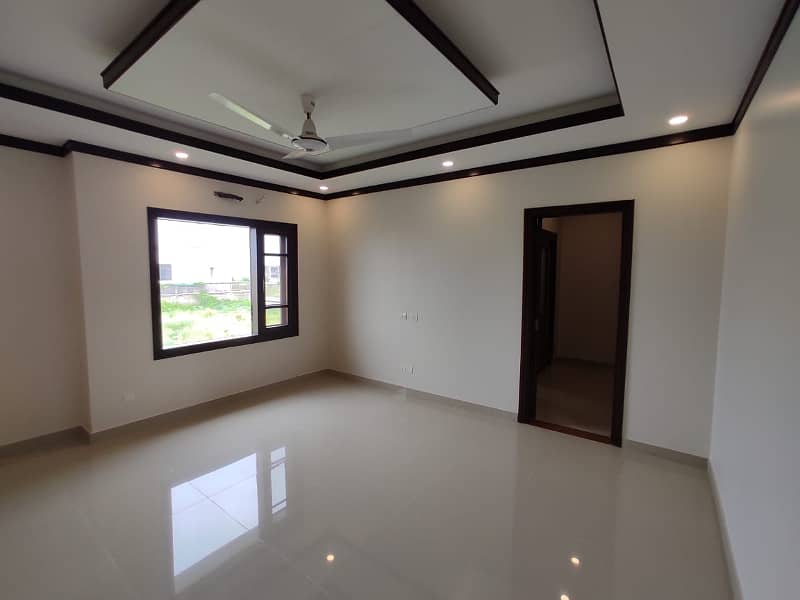Dha Ph 8 Khe Ghalib | Architectural Marvel 1000 Yards 06 Bed House | Cosy Retreat Dining Room | Basement,Gymnasium,A State-Of-The-Art Home Theater | 10 Vehicle Parking | Servant Quaeter | Lush Greenery Lawn | 16