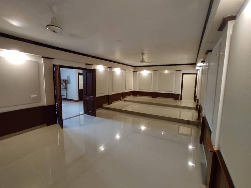 Dha Ph 8 Khe Ghalib | Architectural Marvel 1000 Yards 06 Bed House | Cosy Retreat Dining Room | Basement,Gymnasium,A State-Of-The-Art Home Theater | 10 Vehicle Parking | Servant Quaeter | Lush Greenery Lawn | 22