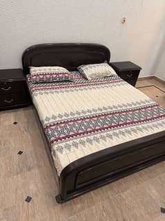 double bed with ortho mattress tables and dressing