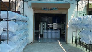 RO water plant for sale, total setup with bottles, stands, bike etc.