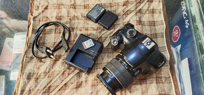 DSLR camera Canon 1200d.           Cards 16GB, 2 batterys. Charger, 2