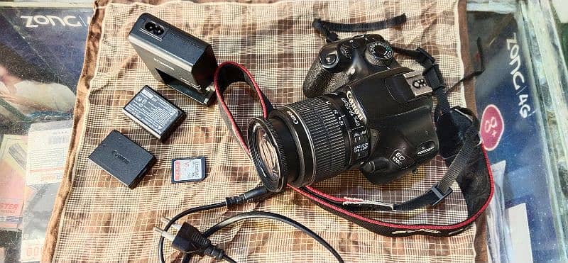 DSLR camera Canon 1200d.           Cards 16GB, 2 batterys. Charger, 3