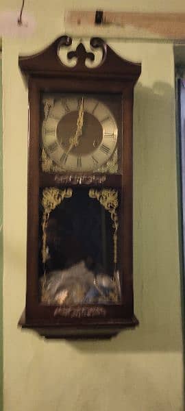 A beautiful old antiques wall clock 0