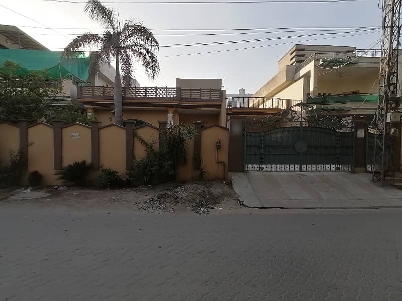 Facing Park 1 Kanal House Ideally Situated In Marghzar Officers Colony 0