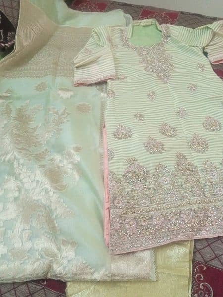 light green imbroidary dress and ruste colour dress heavy embroidery 1