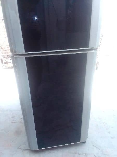 new frige hai cooling perfect hai condition number 2 hai 1