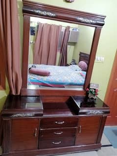 king bed with dressing and side table
