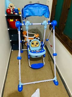 kids swing just like new is available for sale