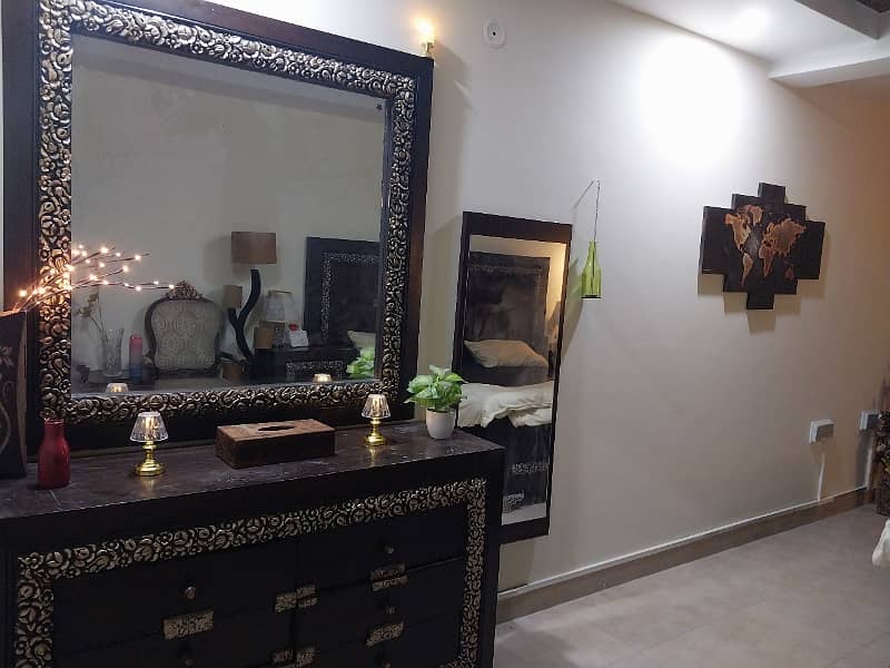 1BED FURNISHED APORTMENT IS AVAILABLE FOR SALE IN SECTOR B BAHRIA TOWN LAHORE 5