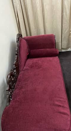 red/maroon dewan with a roll cushion price negotiable