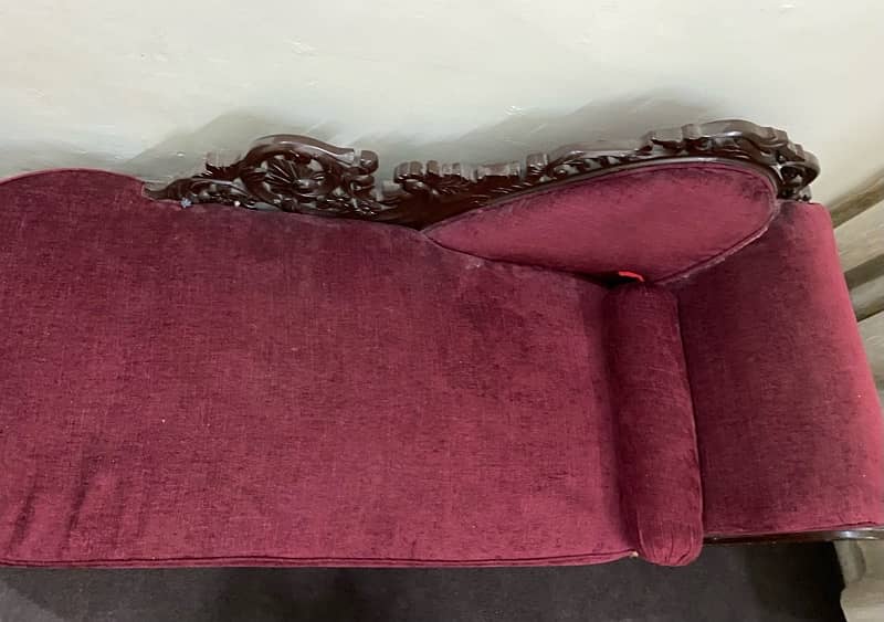 red/maroon dewan with a roll cushion price negotiable 1