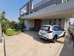 "Prime DHA Phase 7 Rental: 1 Kanal House with Basement at 3.5 Lac"