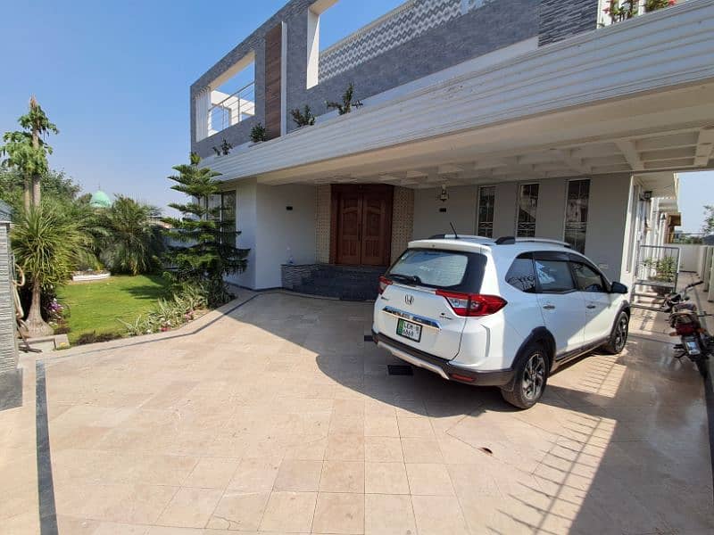 "Prime DHA Phase 7 Rental: 1 Kanal House with Basement at 3.5 Lac" 0