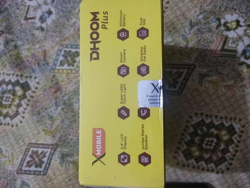 X mobile dual SIM Jambo speaker charger and box available 1