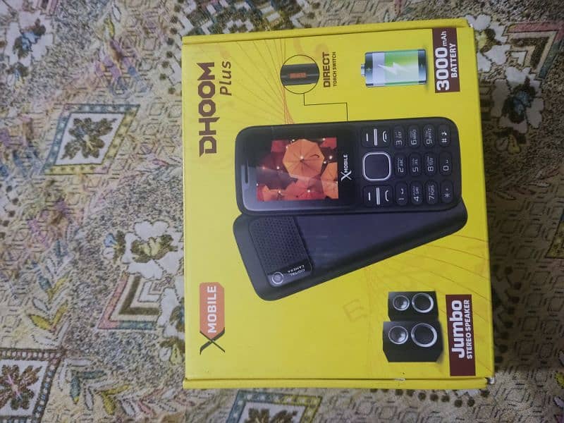 X mobile dual SIM Jambo speaker charger and box available 4