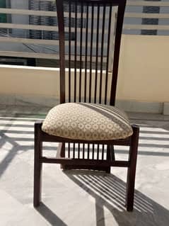 Modern Wooden Chair: Sleek Design, Lasting Quality".   4