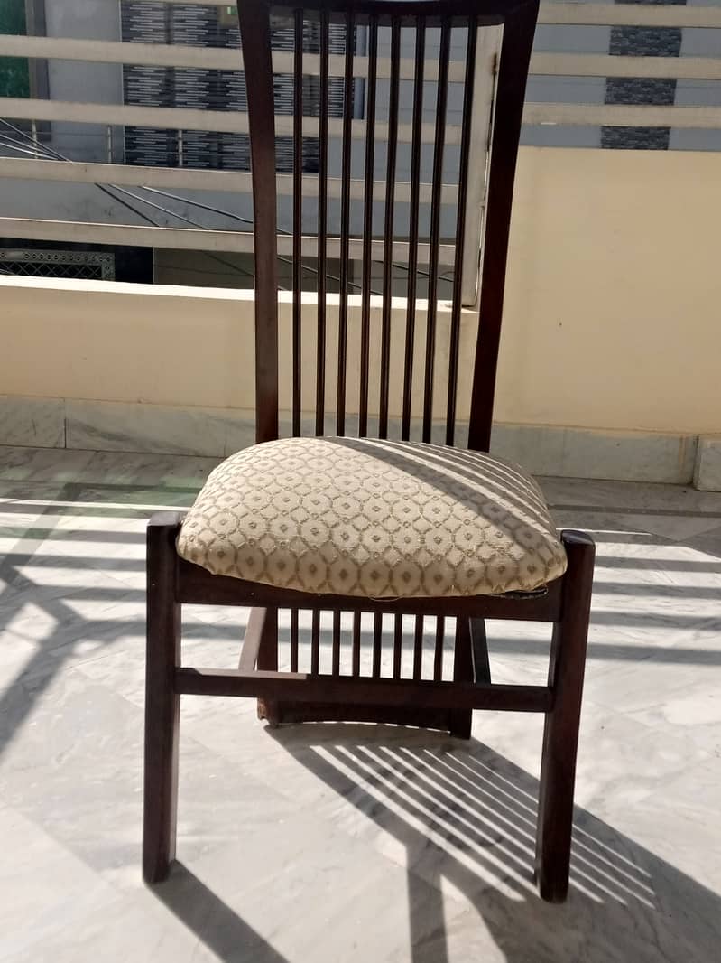 Modern Wooden Chair: Sleek Design, Lasting Quality".   4 0