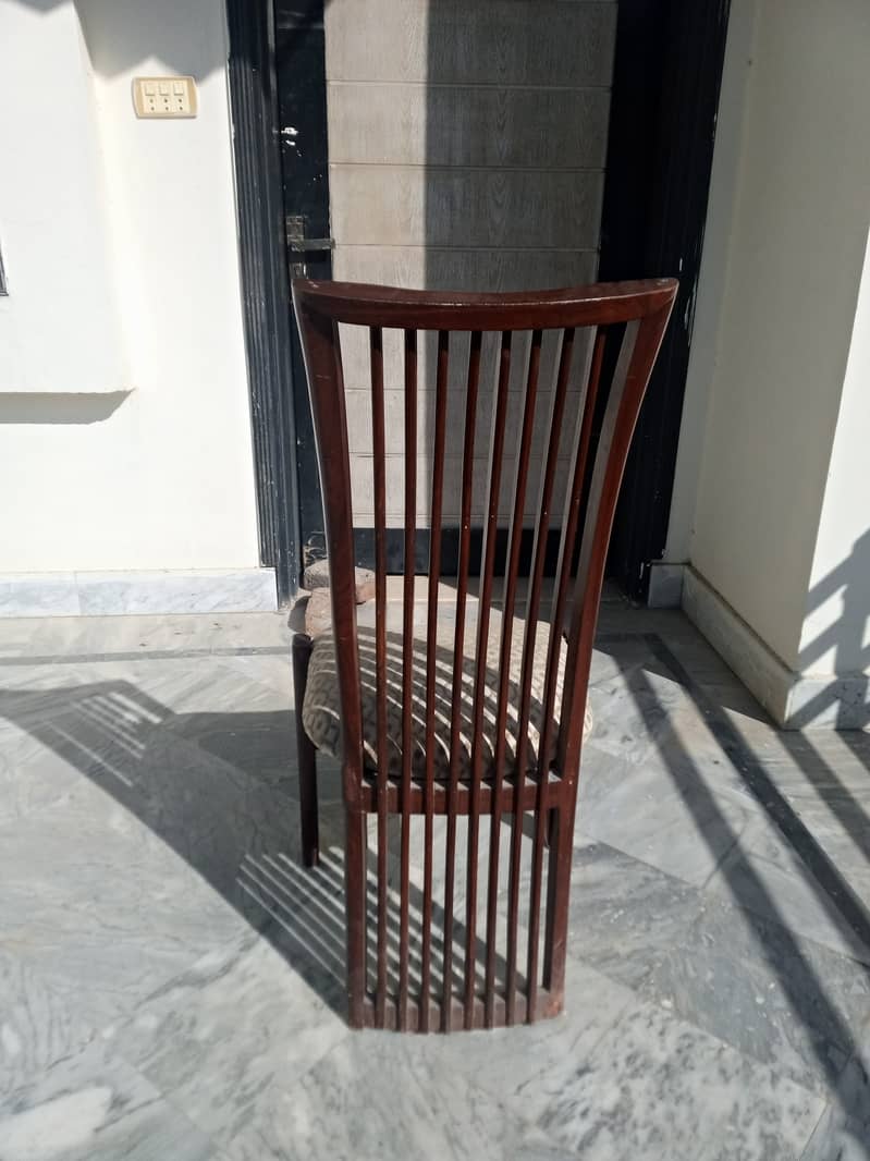 Modern Wooden Chair: Sleek Design, Lasting Quality".   4 2