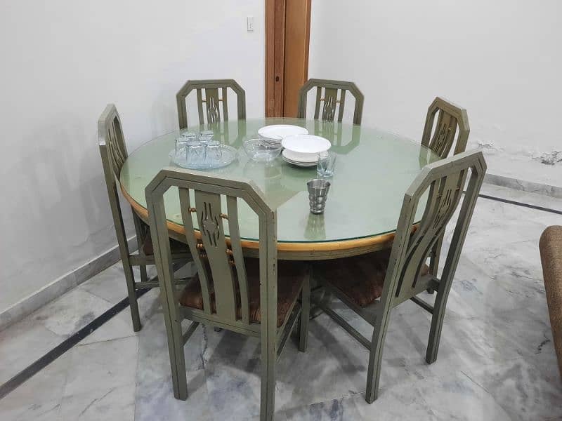 Round Table 5x5 with 6 wood chairs 1