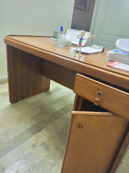 Slightly used office & clinic used table. . . . negotiated 2