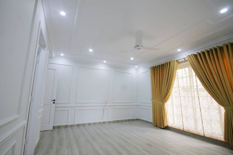 D H A Lahore 1 kanal Brand new Mazher Munir Design House Full Basement with 100% original pics available for Rent 7