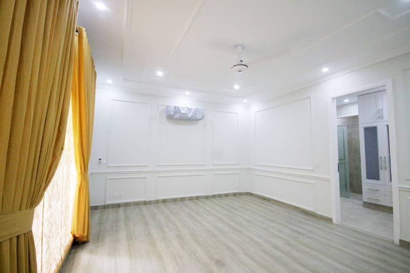 D H A Lahore 1 kanal Brand new Mazher Munir Design House Full Basement with 100% original pics available for Rent 10