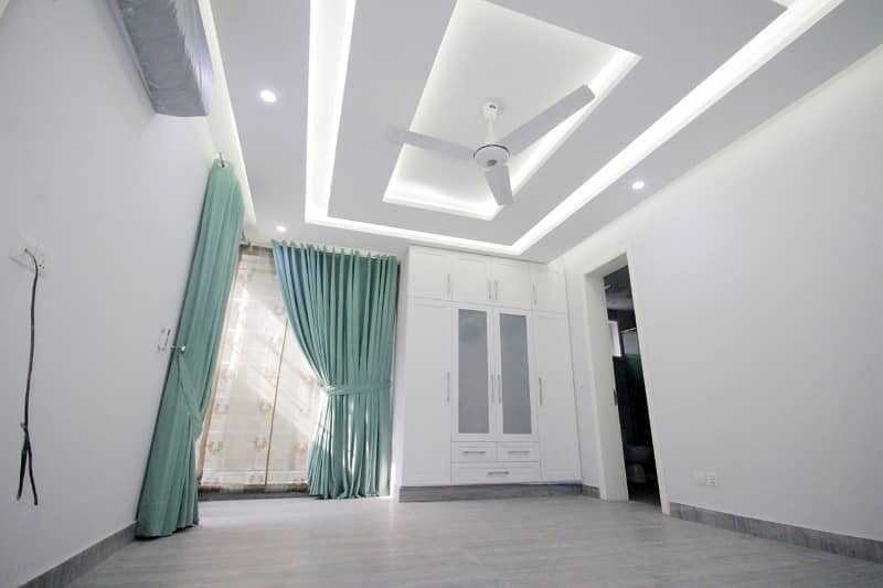 D H A Lahore 1 kanal Brand new Mazher Munir Design House Full Basement with 100% original pics available for Rent 17