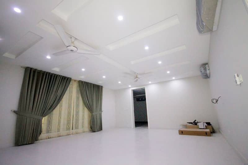 D H A Lahore 1 kanal Brand new Mazher Munir Design House Full Basement with 100% original pics available for Rent 19