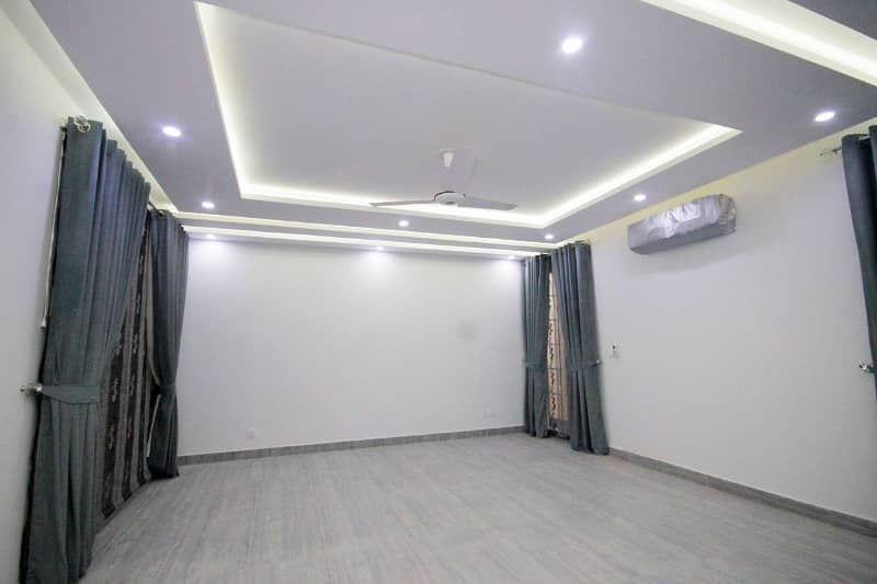 D H A Lahore 1 kanal Brand new Mazher Munir Design House Full Basement with 100% original pics available for Rent 24