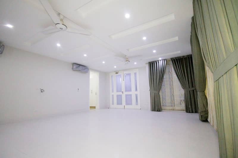 D H A Lahore 1 kanal Brand new Mazher Munir Design House Full Basement with 100% original pics available for Rent 27