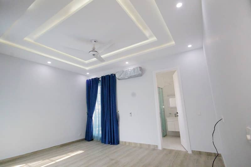 D H A Lahore 1 kanal Brand new Mazher Munir Design House Full Basement with 100% original pics available for Rent 29