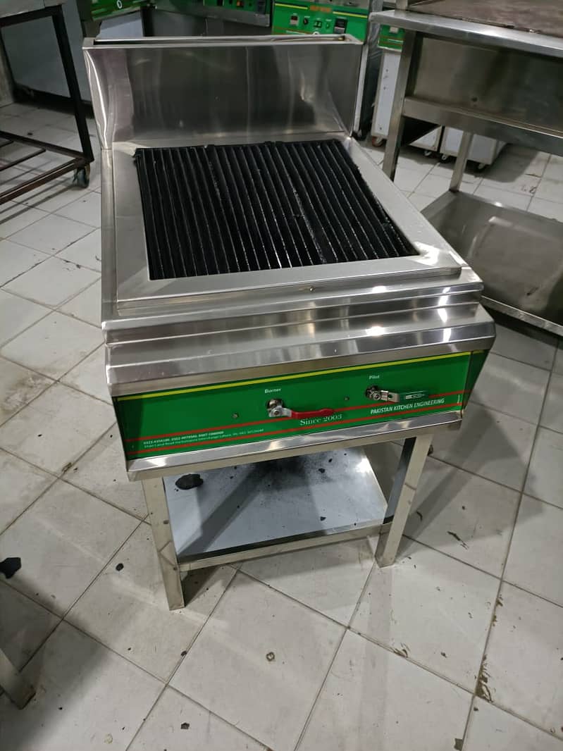 deep fryer, prep table, delivery bags, char coal grill, pizza oven 3