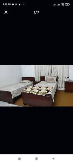 Two single beds + 2 side tables